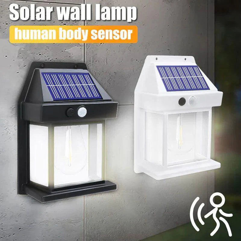 Solar wall lamp with human body sensor on a gray wall