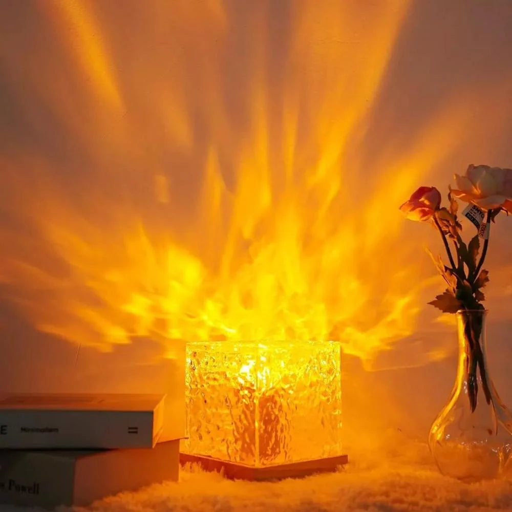 Glass vase with flowers on a snowy surface with a warm glow