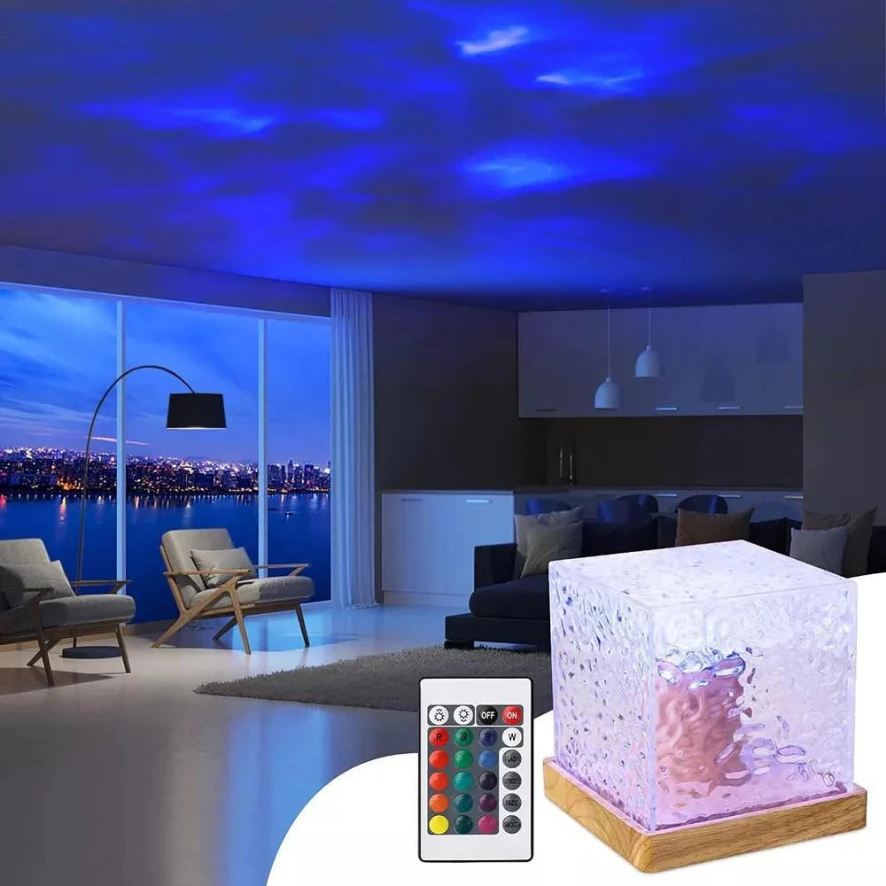 Living room with a cloud-like light projection on the ceiling and a glowing cube on a table.