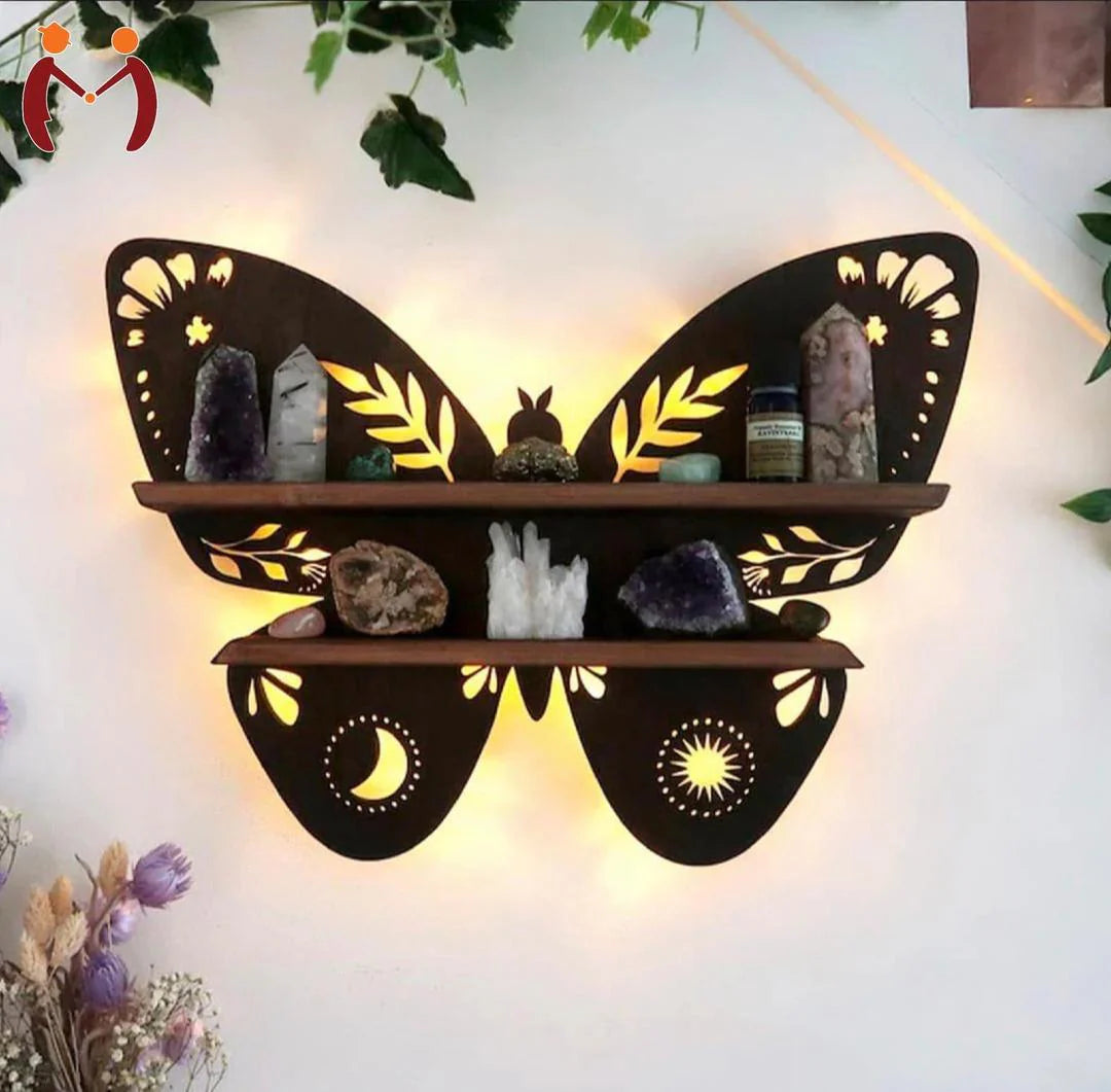 Butterfly-shaped wall shelf with decorative items on a white background