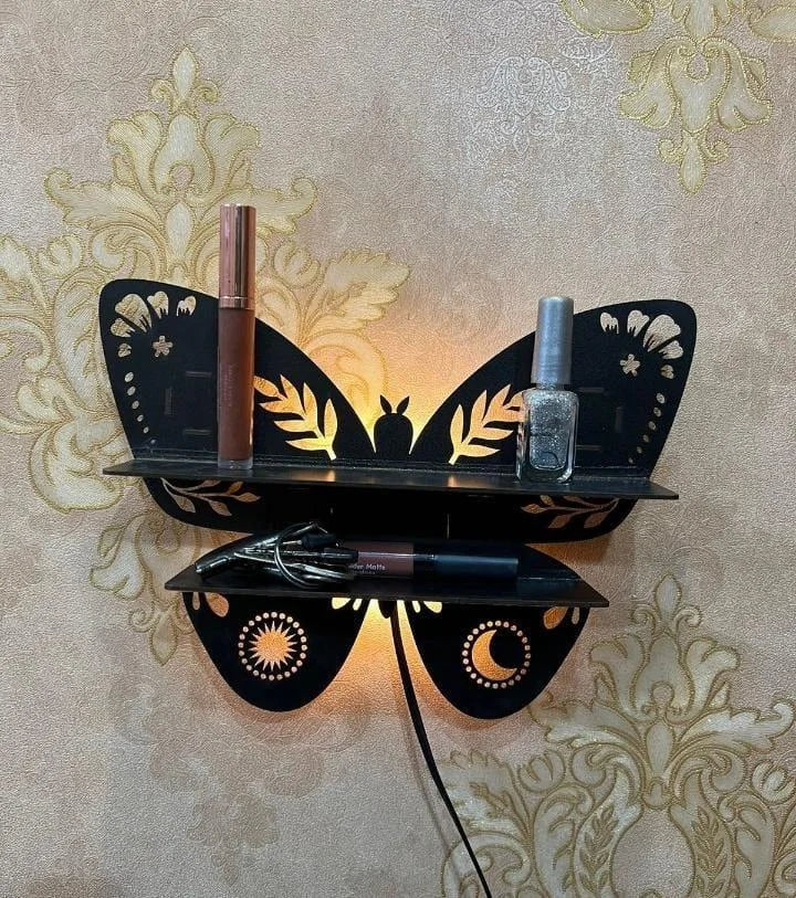 Butterfly-shaped wall shelf with cosmetic items on a decorative wall.