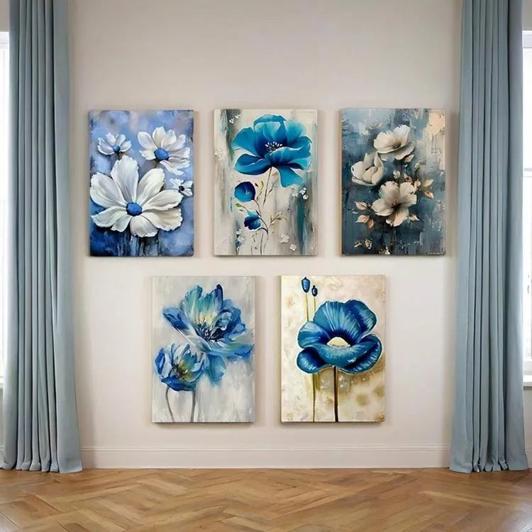 Set of six floral paintings with blue and white flowers on a wall.