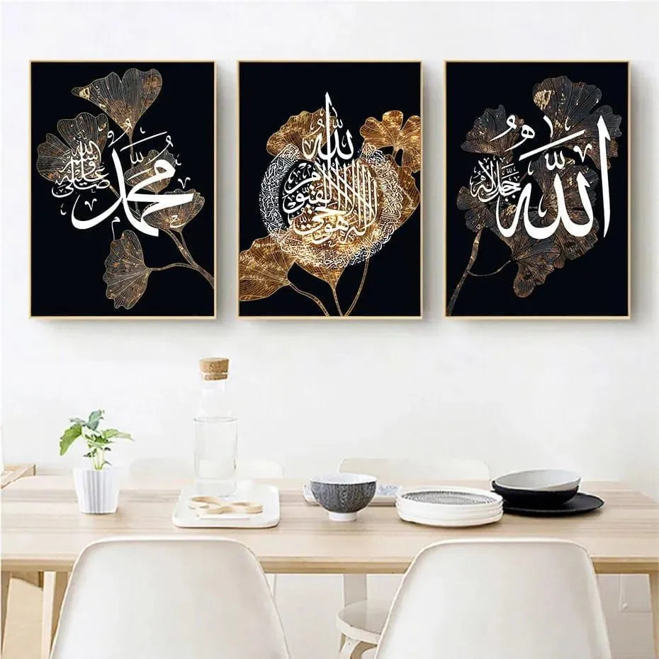 Three framed artworks with Arabic calligraphy on a wall above a dining table.