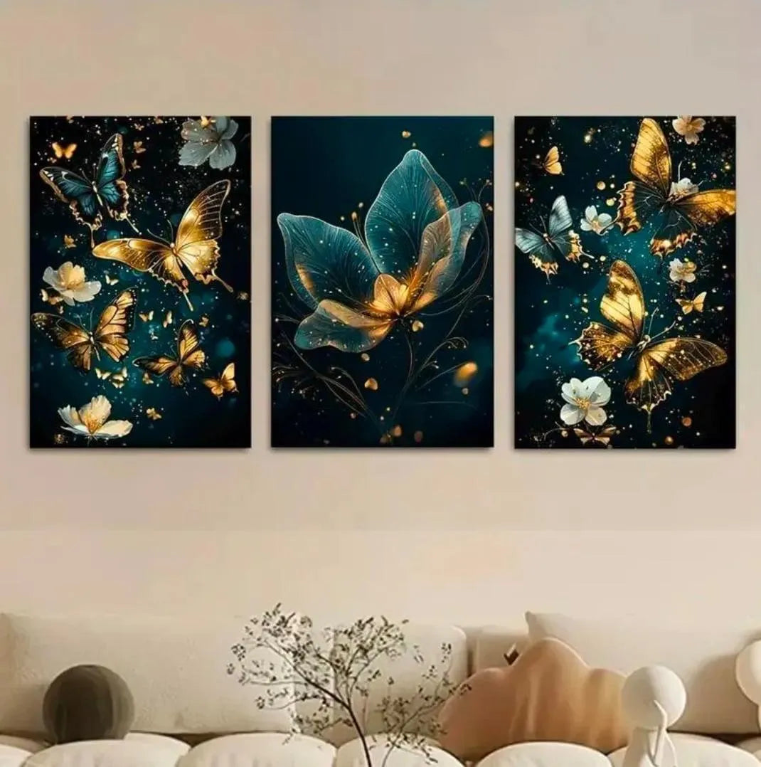 Three butterfly-themed wall art pieces on a wall above a sofa.