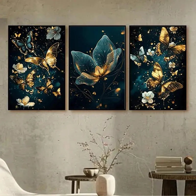 Three framed artworks with butterfly and floral designs on a wall.