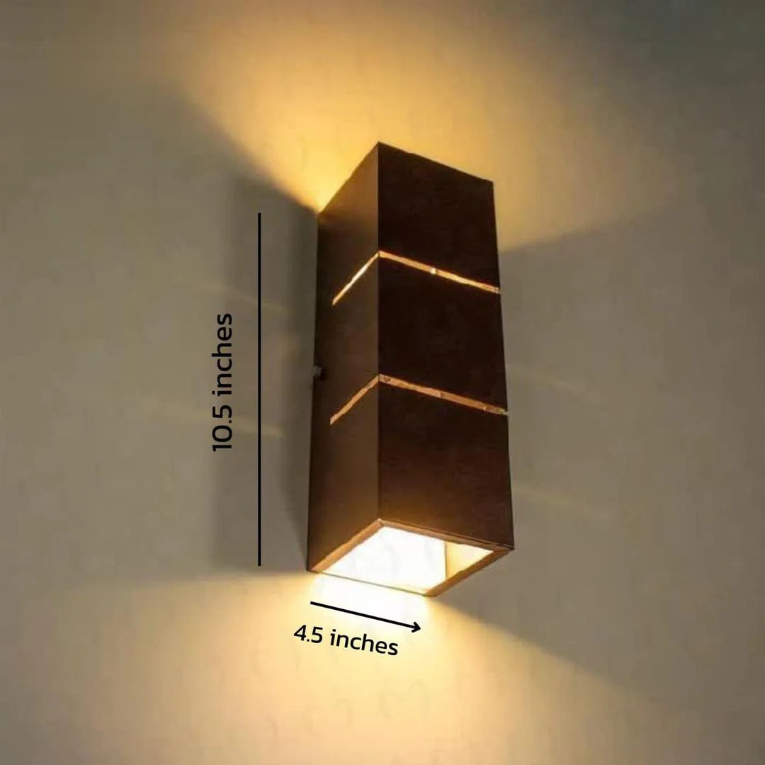 Wall-mounted outdoor light fixture with dimensions indicated on a neutral background