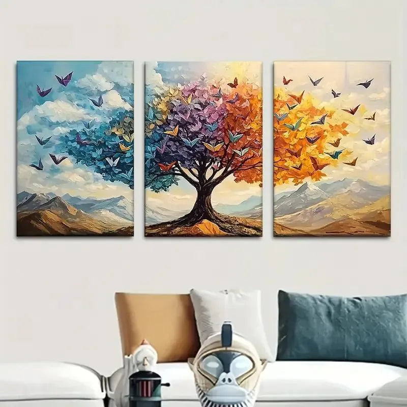 Three-panel wall art of a tree with colorful leaves and butterflies in a living room setting.