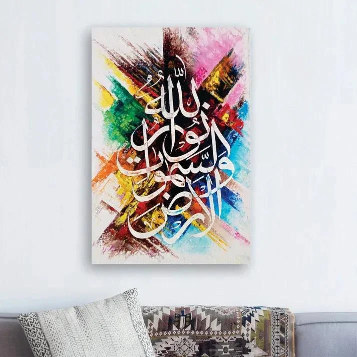 Colorful abstract painting with Arabic calligraphy on a white wall above a sofa.