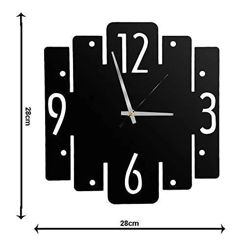 Black square wall clock with white numbers and measurements on a white background