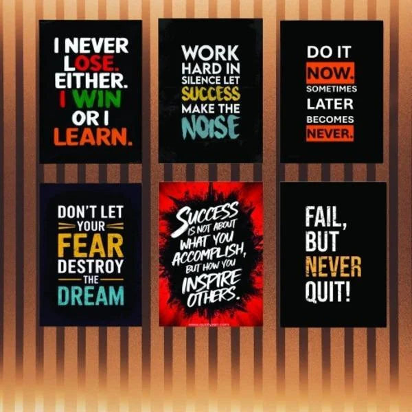 Motivational posters with inspirational quotes on a wooden background
