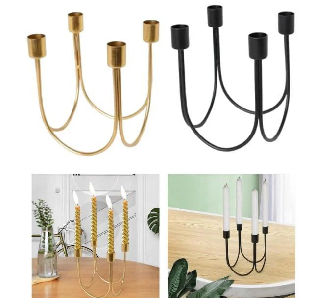 Two candle holders, one gold and one black, with candles in a home setting.