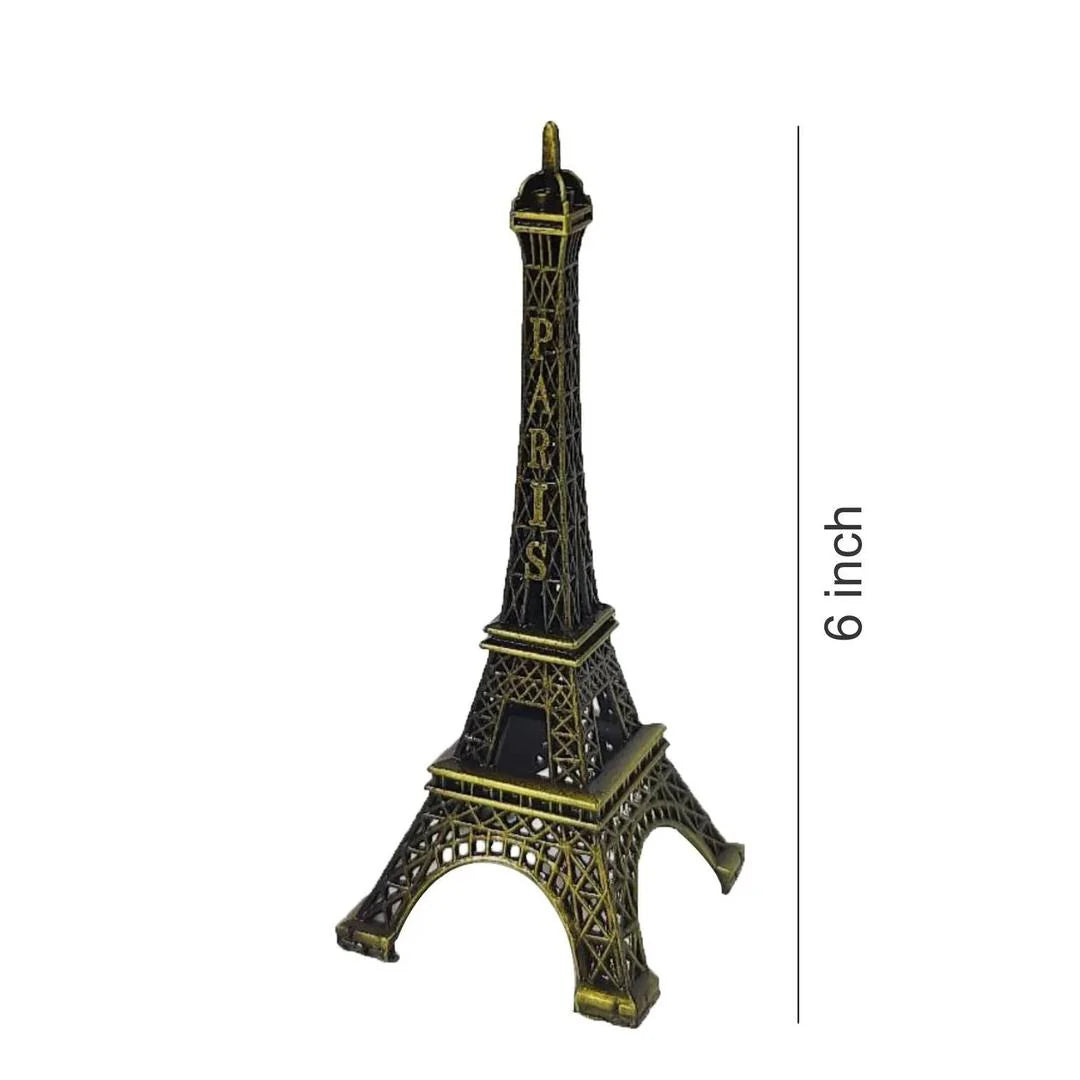 Model of the Eiffel Tower with 'Paris' text, shown with a measurement of 6 inches on a white background.