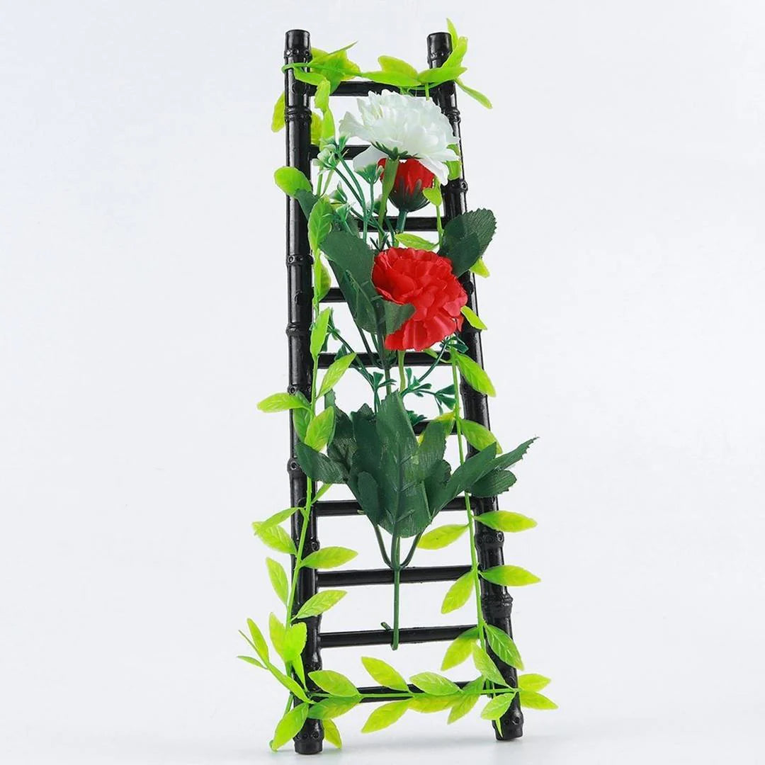 Decorative ladder with artificial flowers and leaves on a white background