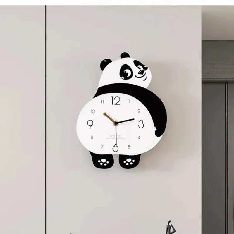 Panda-shaped wall clock on a light gray wall
