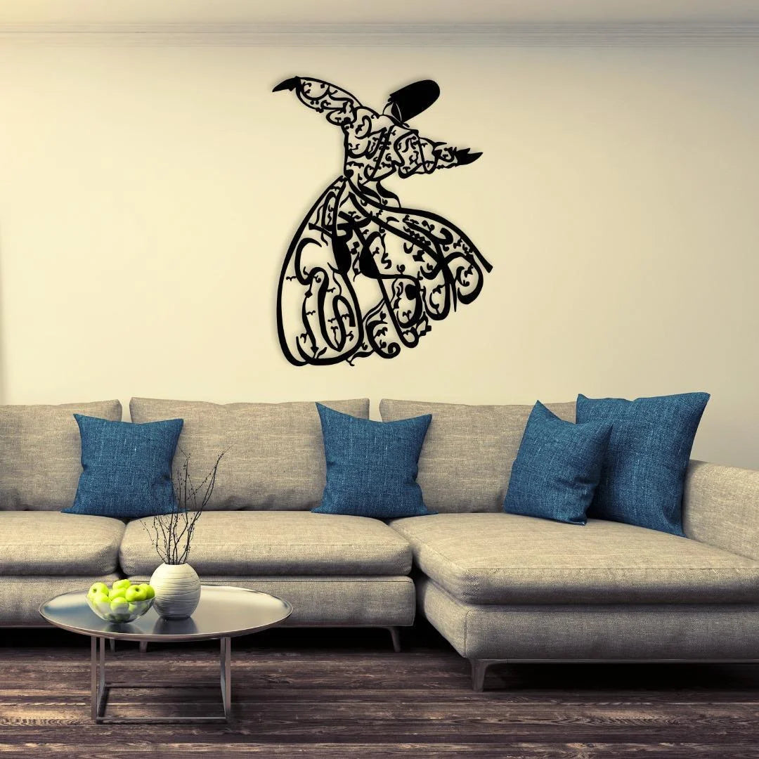 Decorative wall art of a dancer on a beige wall above a gray sectional sofa with blue pillows.