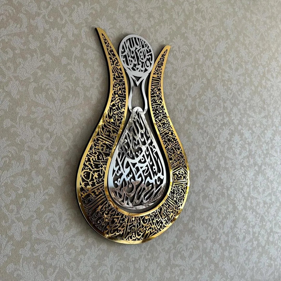 Decorative wall hook with intricate patterns on a textured beige background