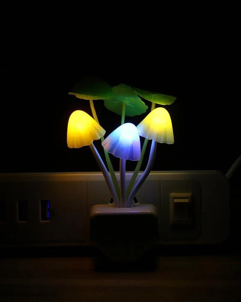 Colorful mushroom-shaped night light on a dark background