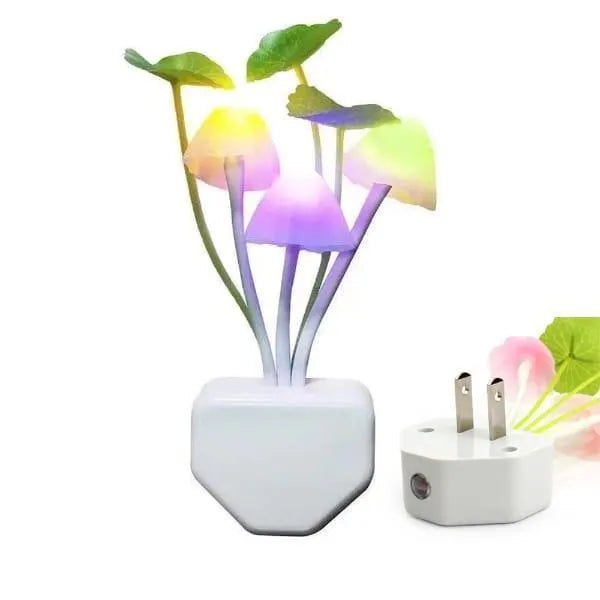 Colorful LED night light with leaf design and plug adapter on a white background