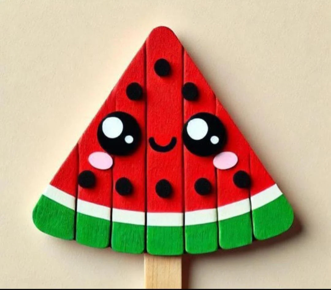 Wooden watermelon slice craft on a stick with a beige background