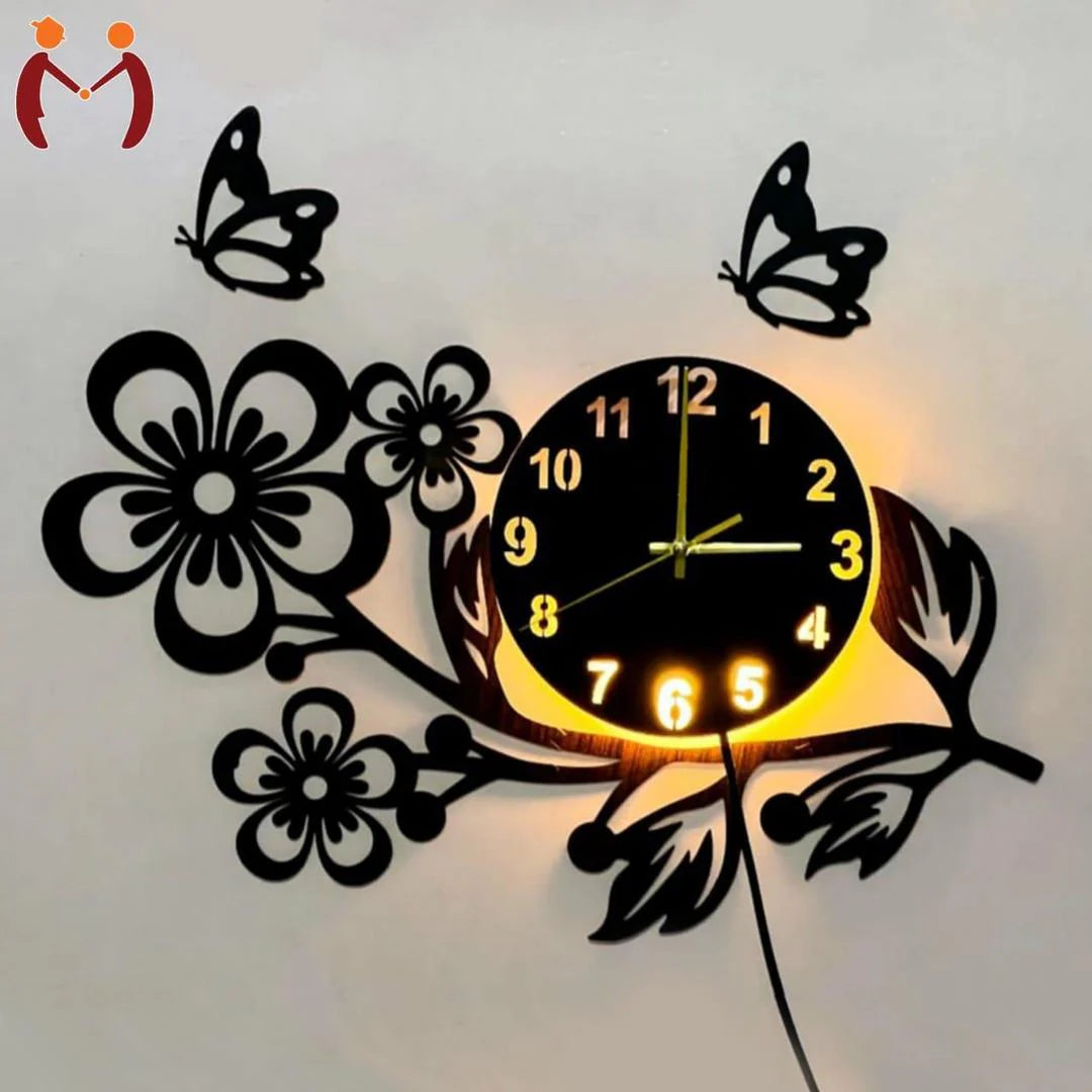 Decorative wall clock with floral and butterfly designs on a light gray background