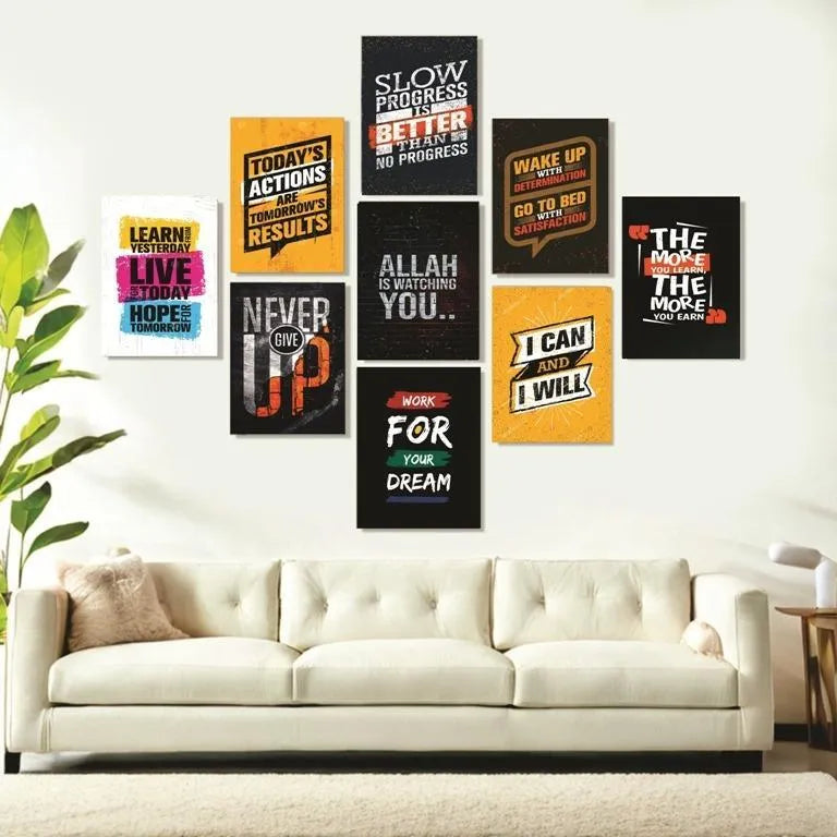 Motivational posters on a wall above a white sofa