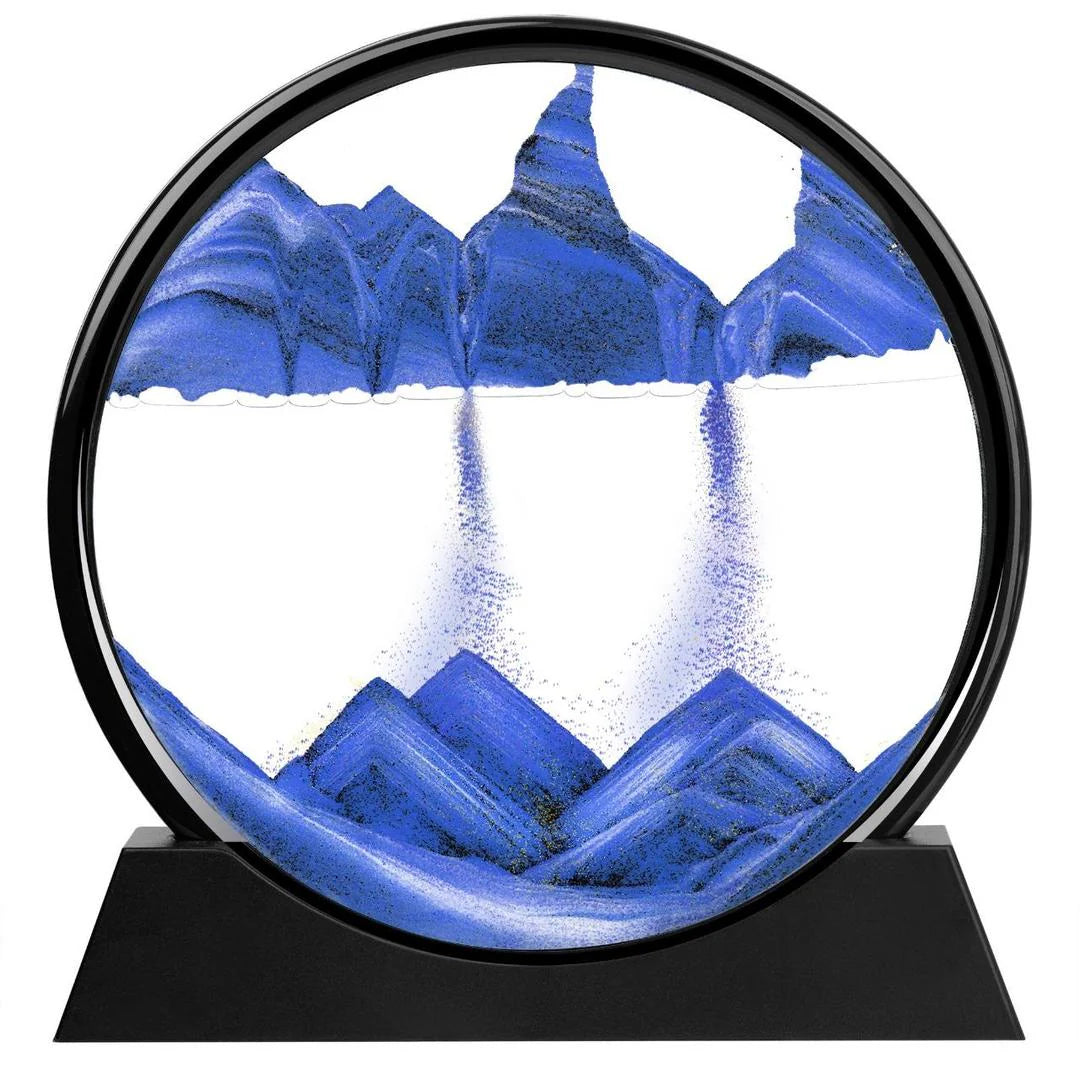 Round decorative item with blue mountain design inside a black frame on a white background