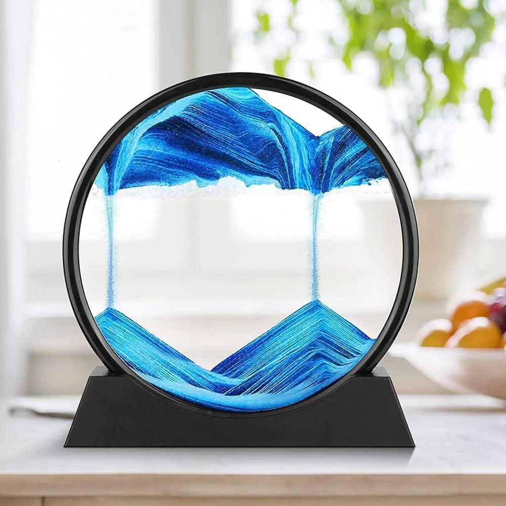 Decorative circular piece with blue and white design on a black stand, set against a blurred indoor background.